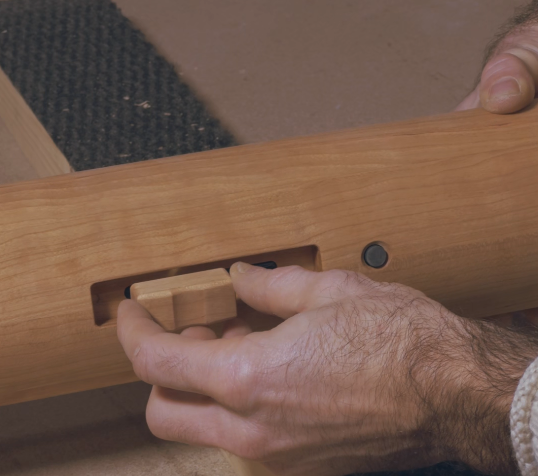 Hand on the slider dimmer in Echo One