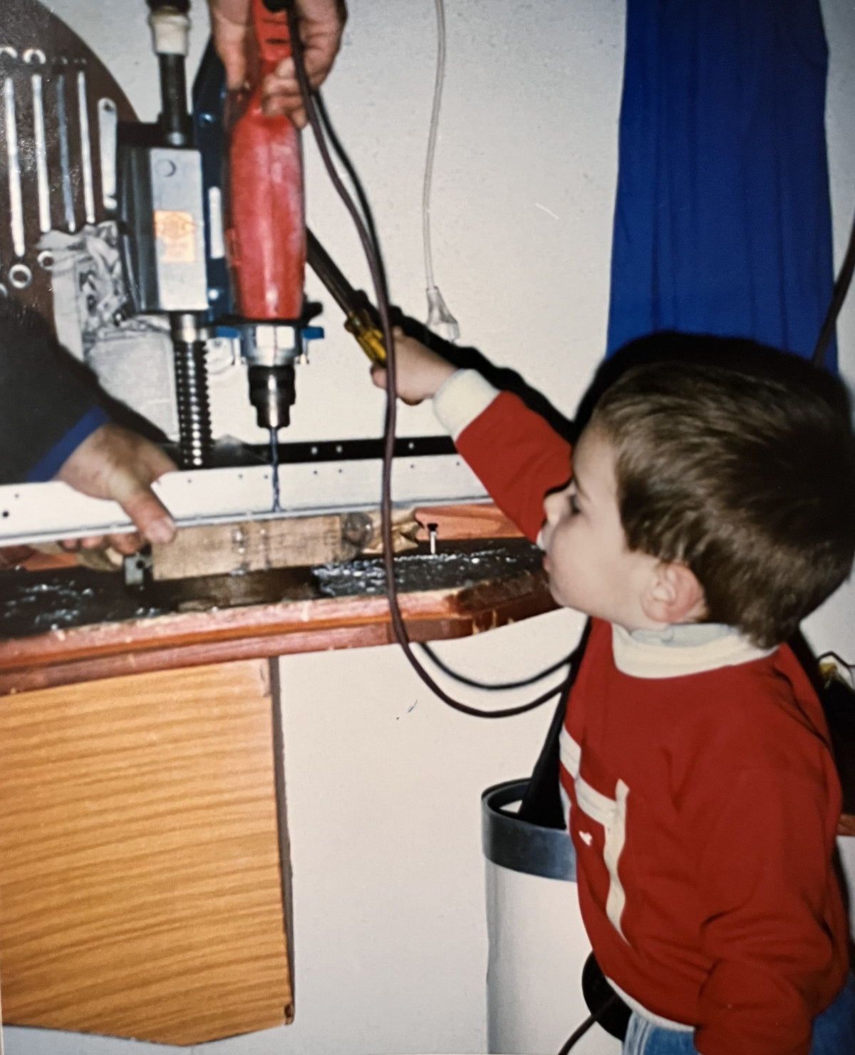 Zdenko as a small boy at the pillar drill